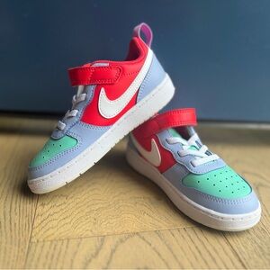 Unisex Kids Nike Low Top Sneakers - Size 10C, never worn outside.